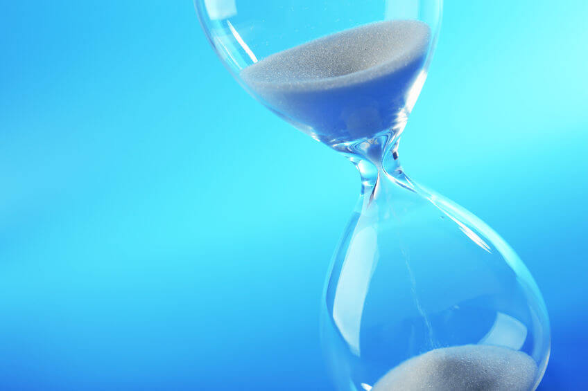53933037 - hourglass on blue background